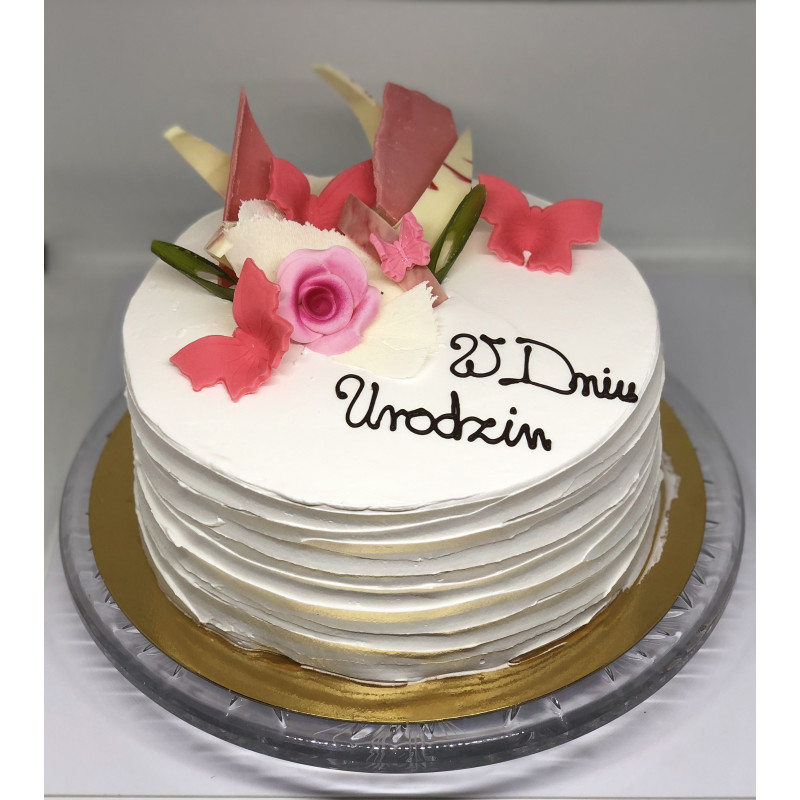 Tort okrągły z dekoracją czekoladową oraz czerwona róża ręczeni lepiona